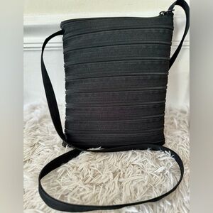 Nonie Total Zip Crossbody Bag